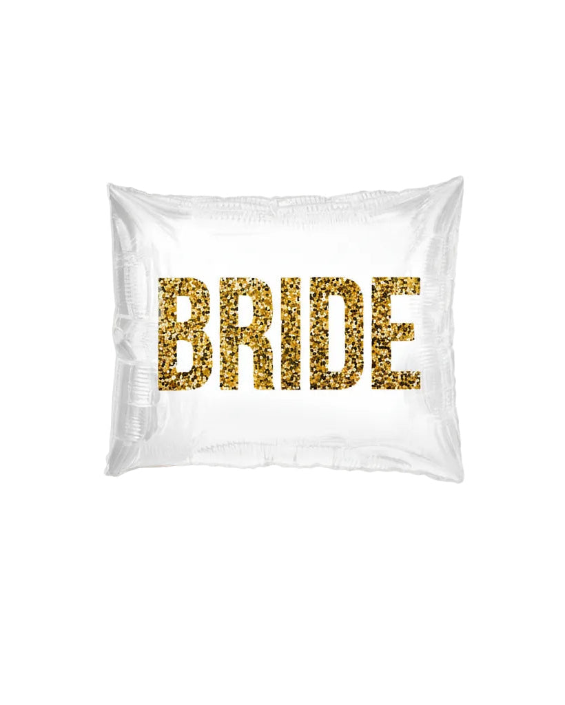 White pillowcase with gold glitter text spelling 'BRIDE' on a white background