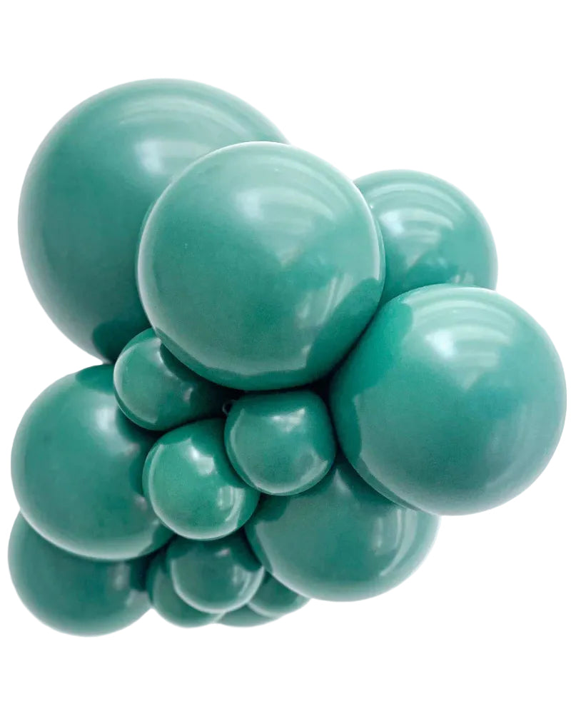 Teal-colored stress ball with multiple spheres on a white background