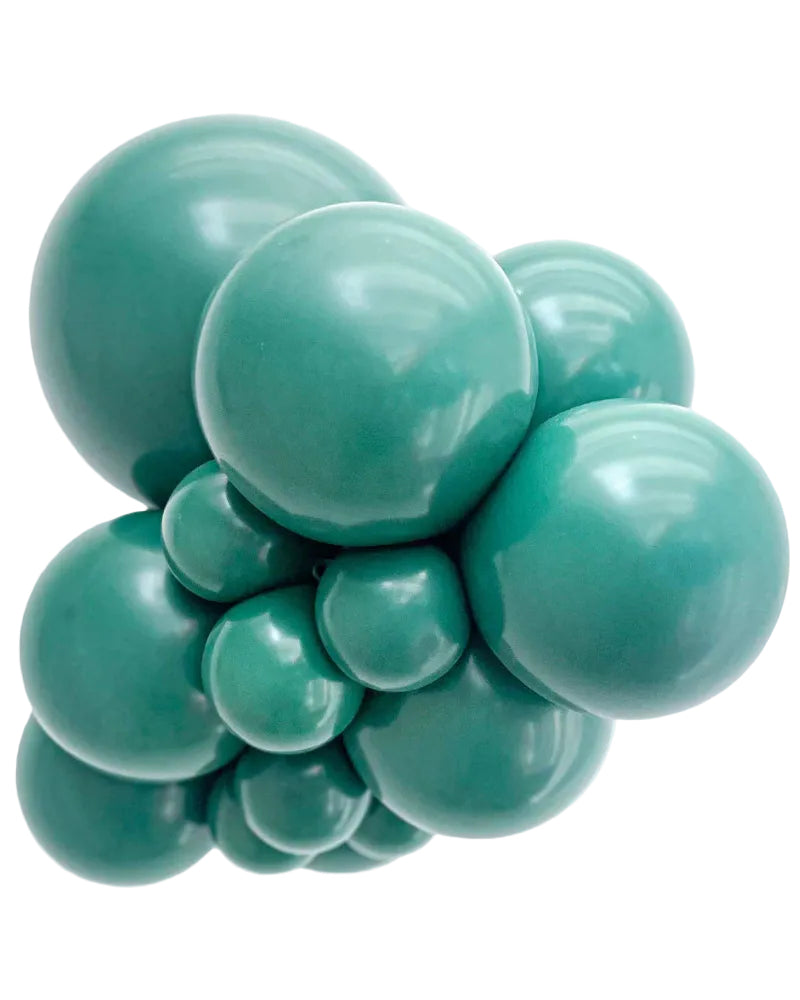 Teal-colored stress ball with multiple spheres on a white background