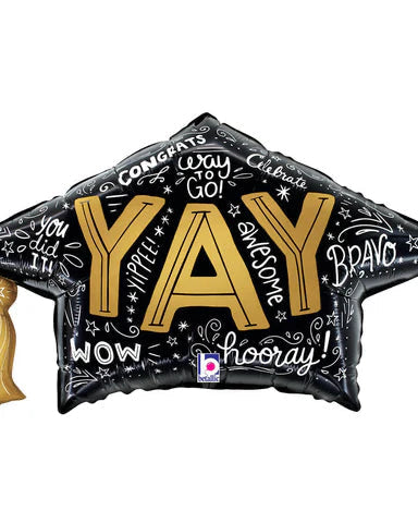 Graduation cap-shaped balloon with celebratory text and a gold tassel on a white background