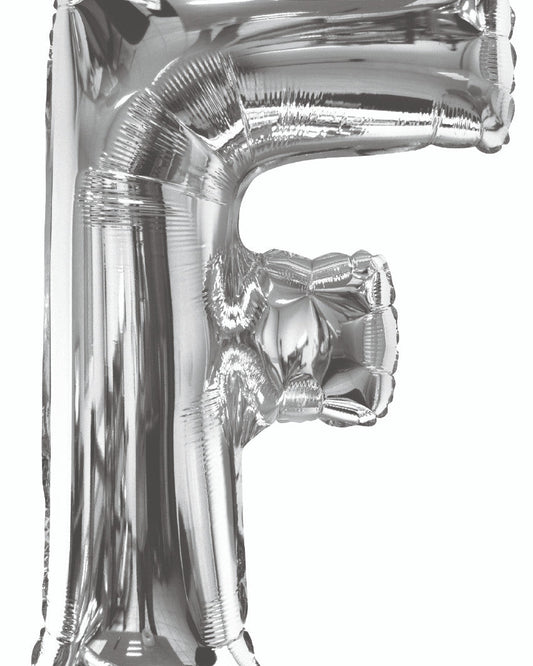 Silver letter 'F' balloon on a white background