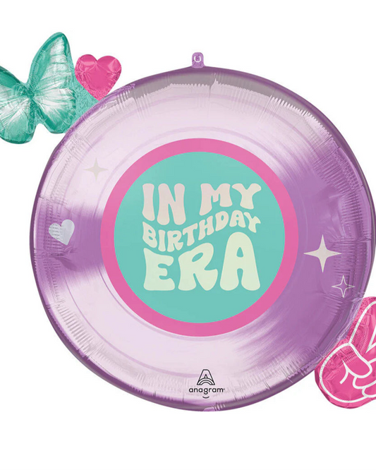 Round balloon with 'In My Birthday Era' text, butterfly, heart, and peace sign decorations on a white background.