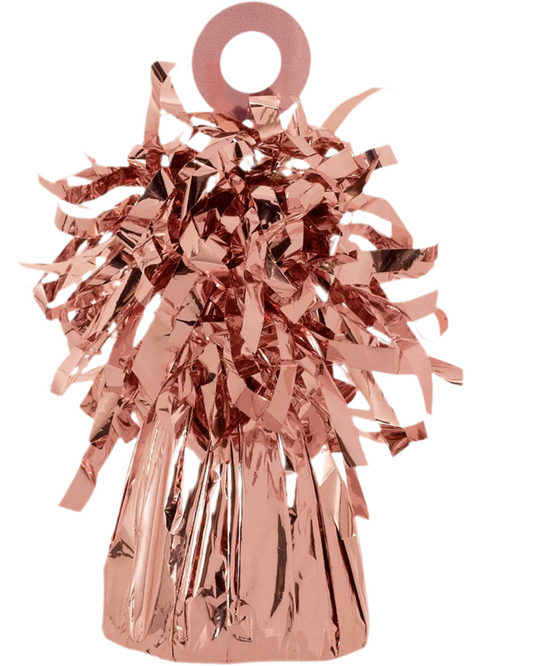 Rose gold tinsel pom-pom on a white background