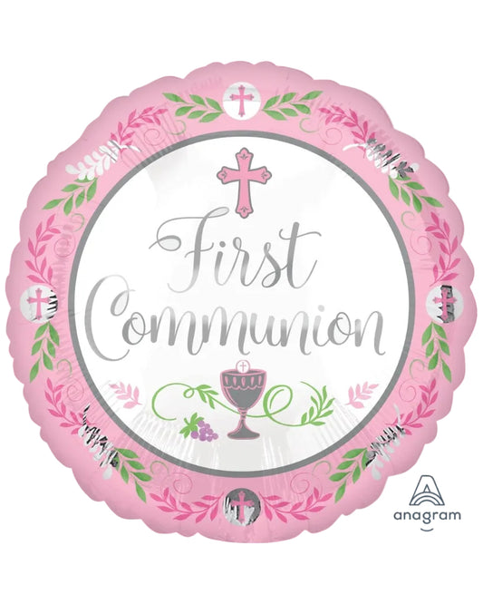 Pink 'First Communion' balloon with religious symbols on a white background