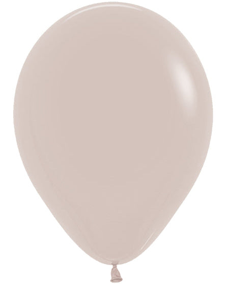 A single matte balloon in a light warm beige or blush-tinted off-white color, shown inflated against a plain white background.