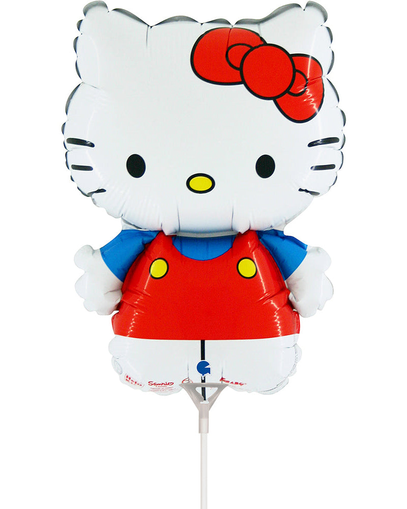 Balloon shaped like a character with a red dress and blue shirt on a white background