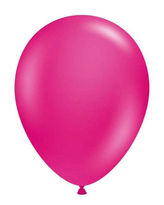 Single pink balloon on a white background