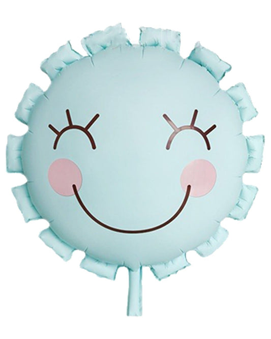 Light blue circular pillow with a smiley face design on a white background