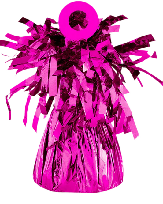 Pink tinsel ball decoration on a white background