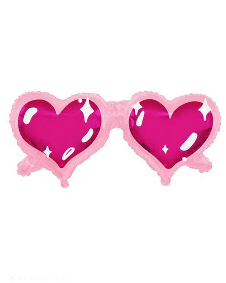 Heart-shaped sunglasses with pink frames and pink lenses on a white background