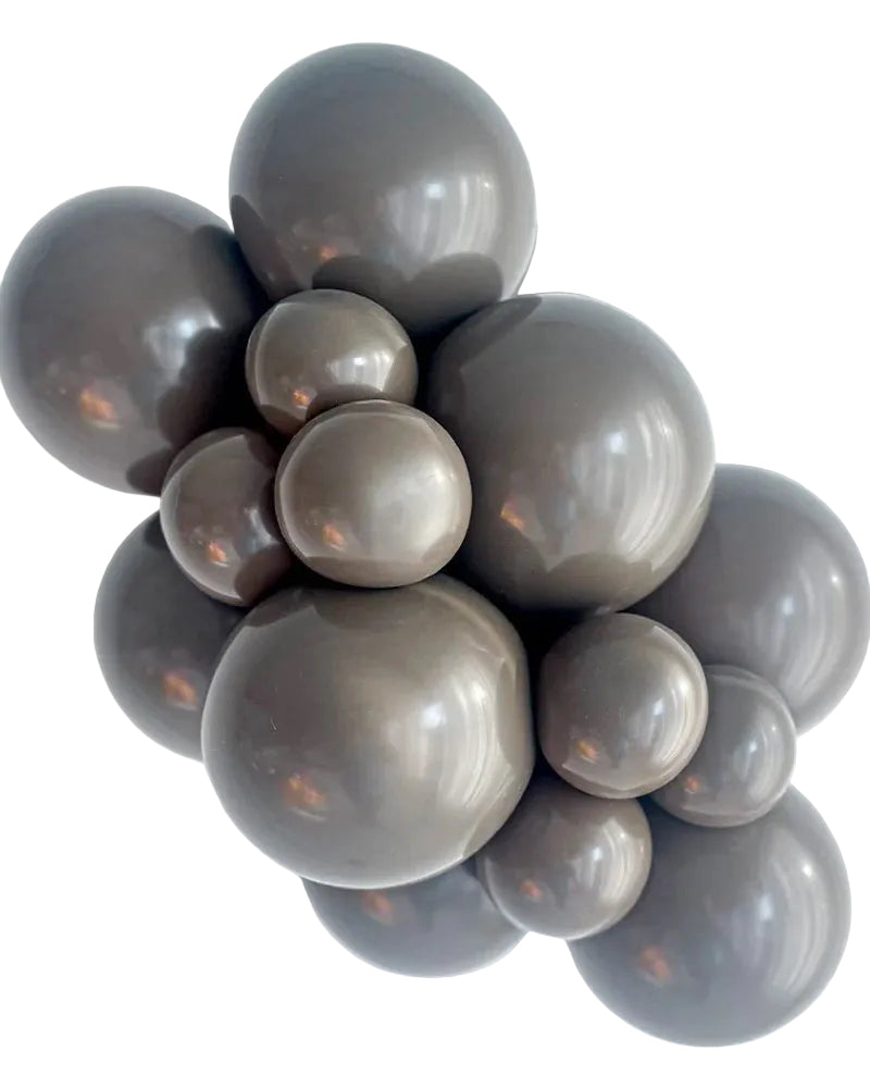 Cluster of gray balloons on a white background