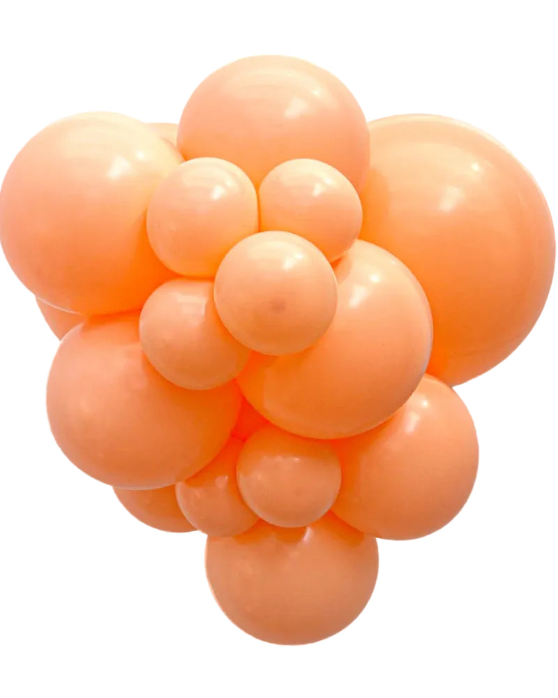 Cluster of orange balloons on a white background