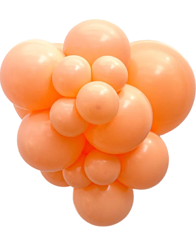 Cluster of orange balloons on a white background