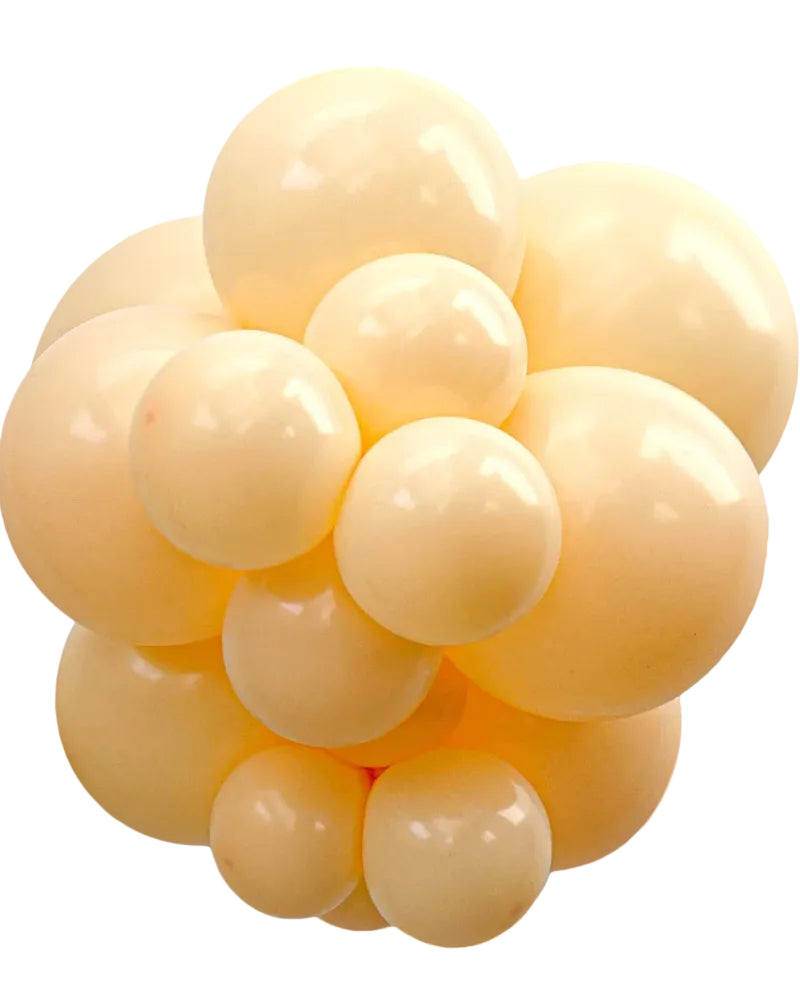 Cluster of beige balloons on a white background