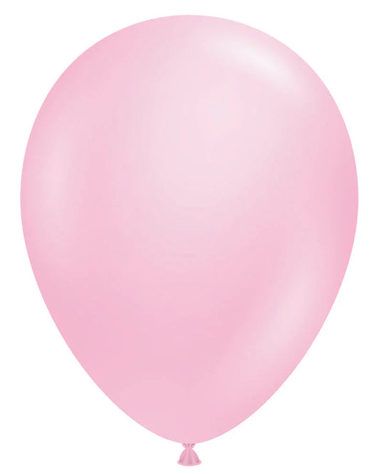 Single pink balloon on a white background