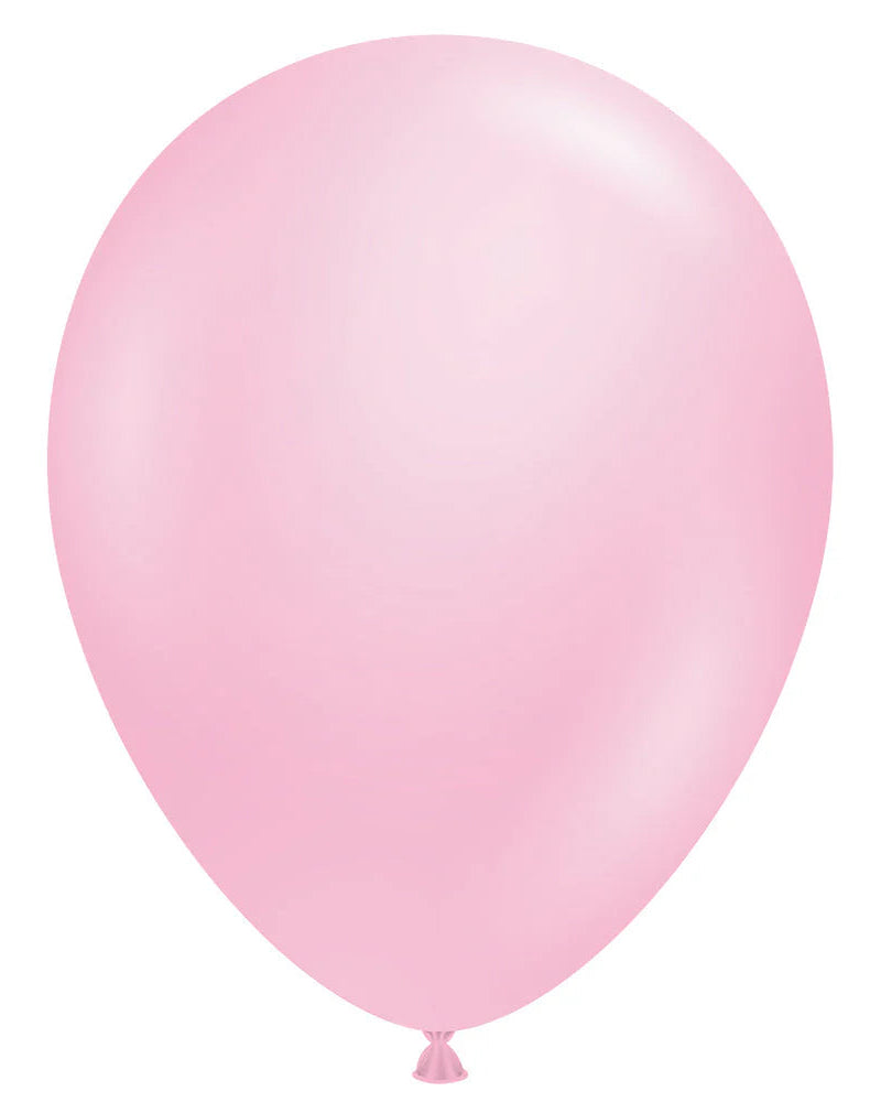 Single pink balloon on a white background