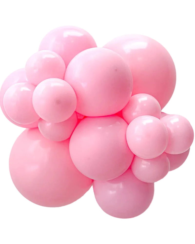 Cluster of pink balloons on a white background