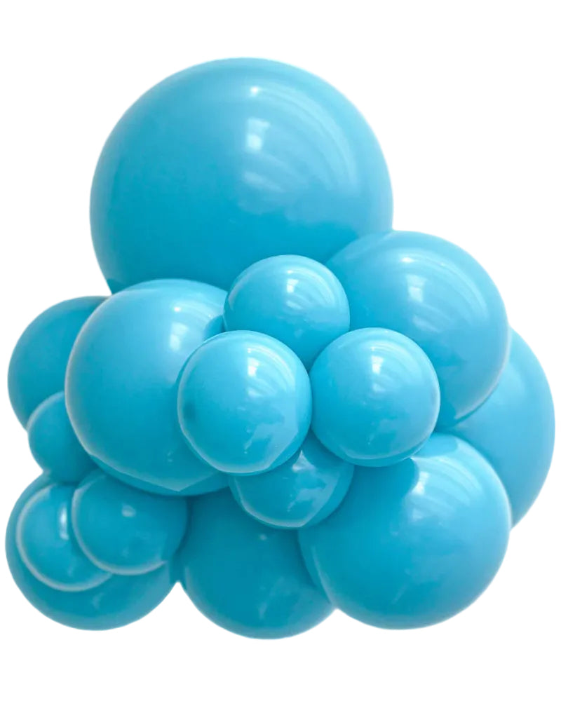 Cluster of blue balloons on a white background