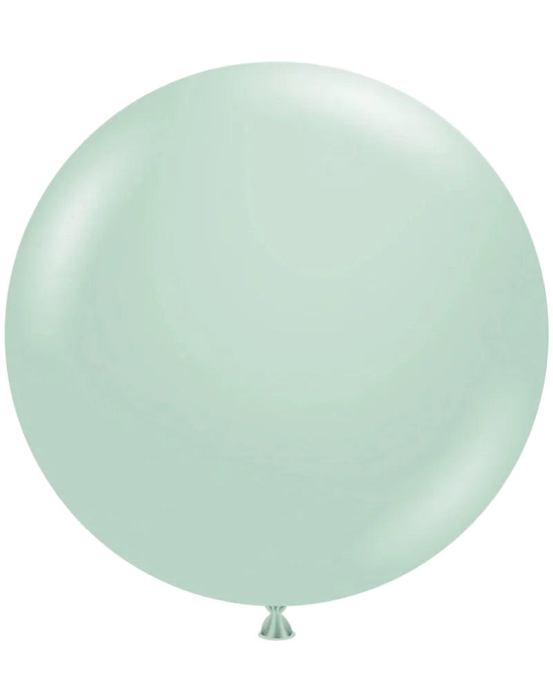 Single light green balloon on a white background