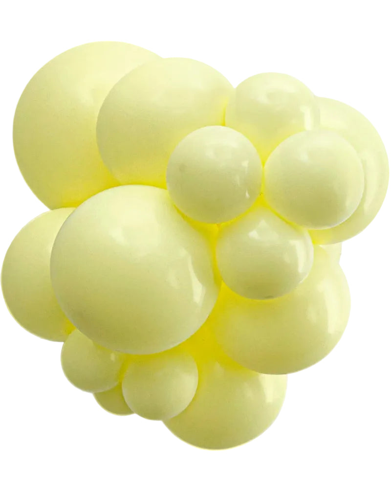 Cluster of light yellow balloons on a white background