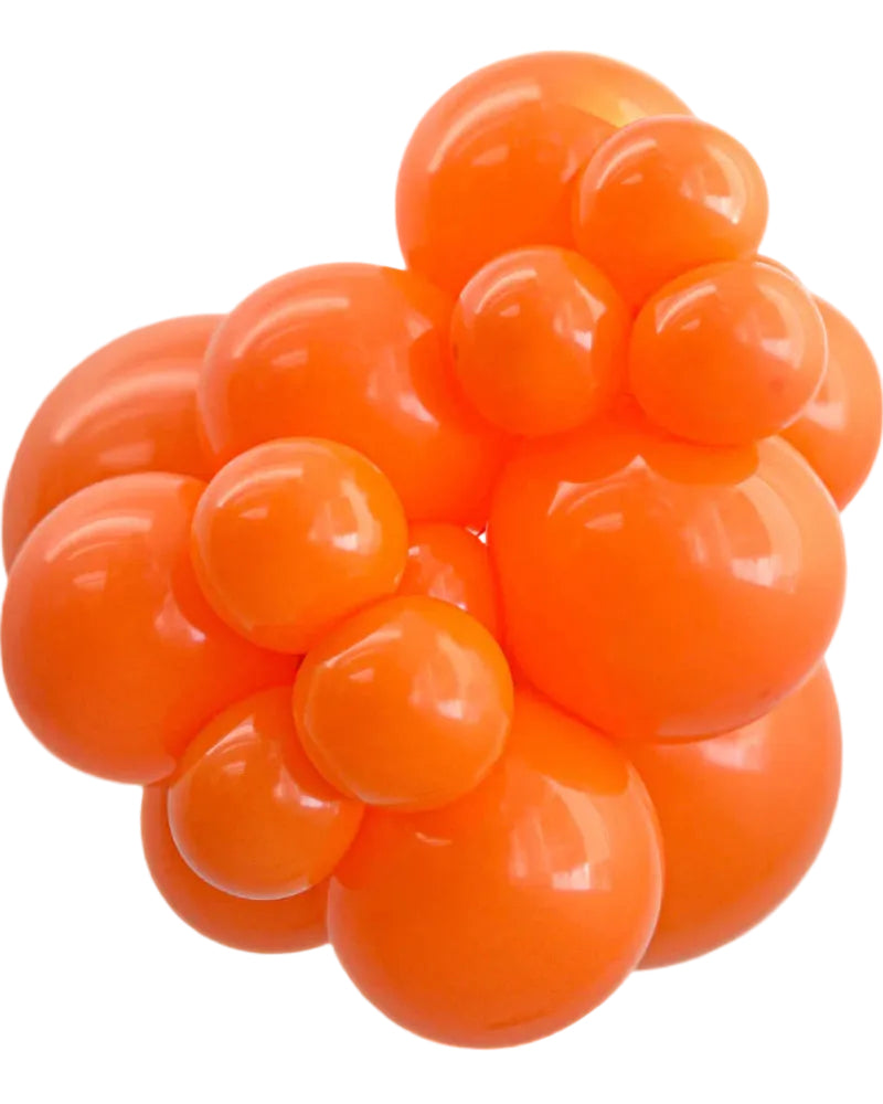 Cluster of orange balloons on a white background