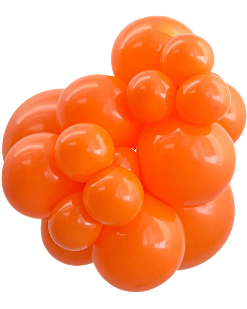Cluster of orange balloons on a white background