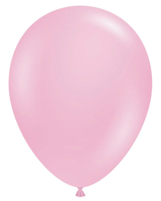Single pink balloon on a white background