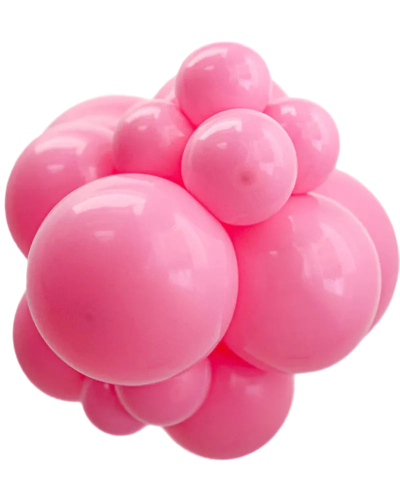 Cluster of pink balloons on a white background