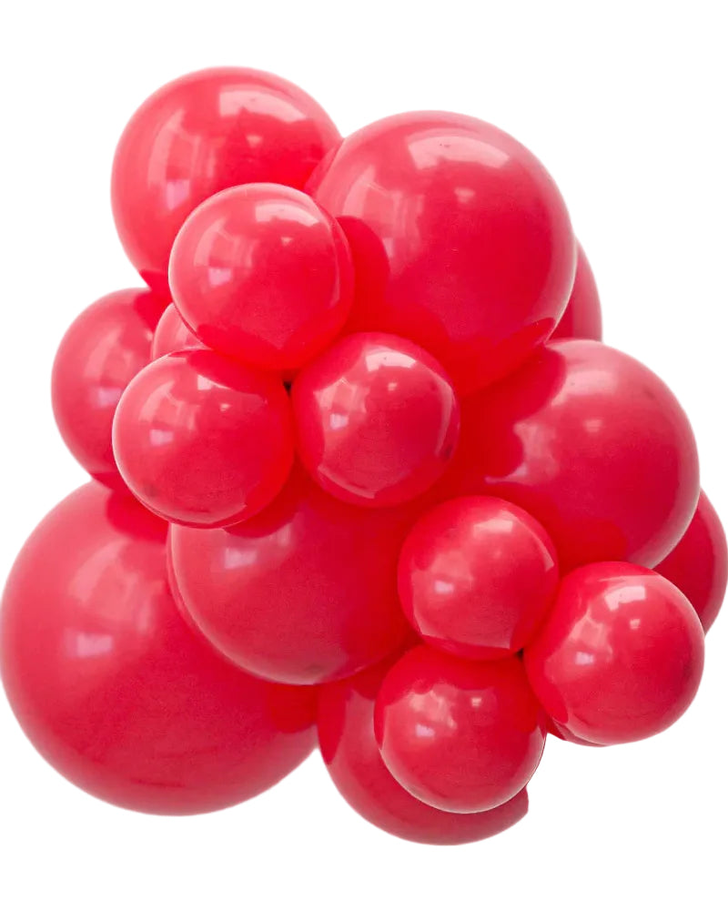 Cluster of red balloons on a white background