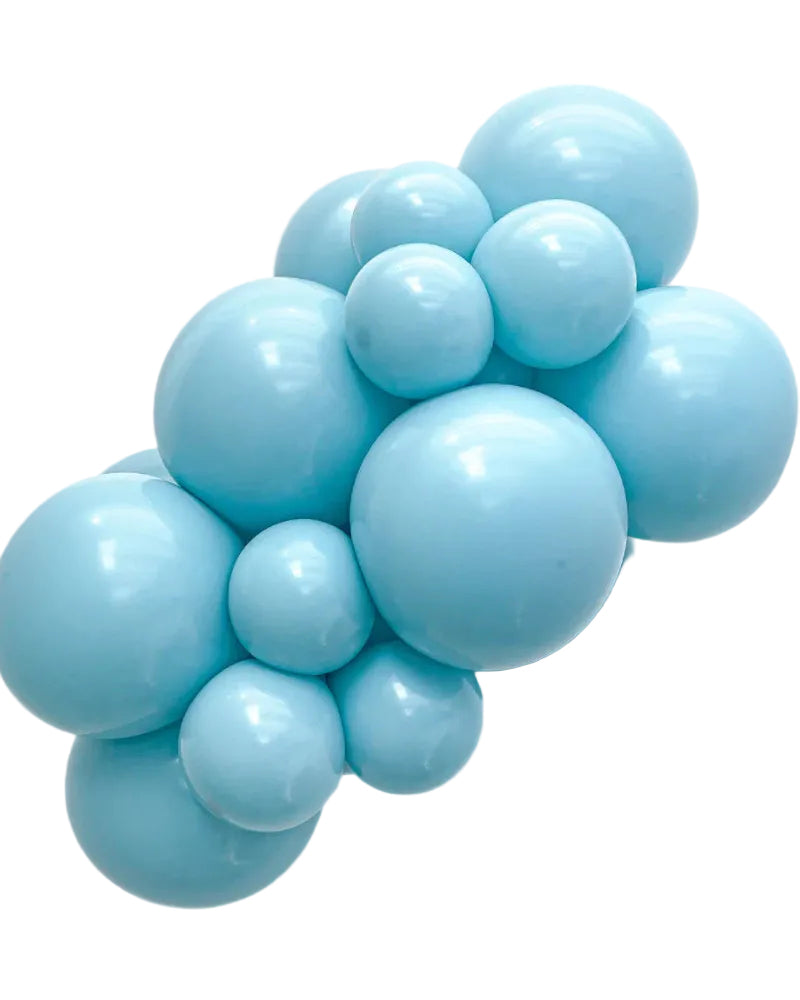 Cluster of light blue balloons on a white background