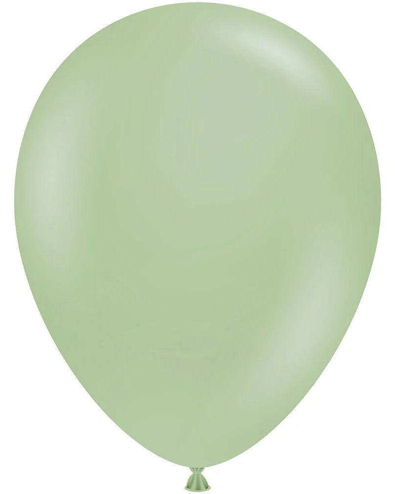 Single light green balloon on a white background