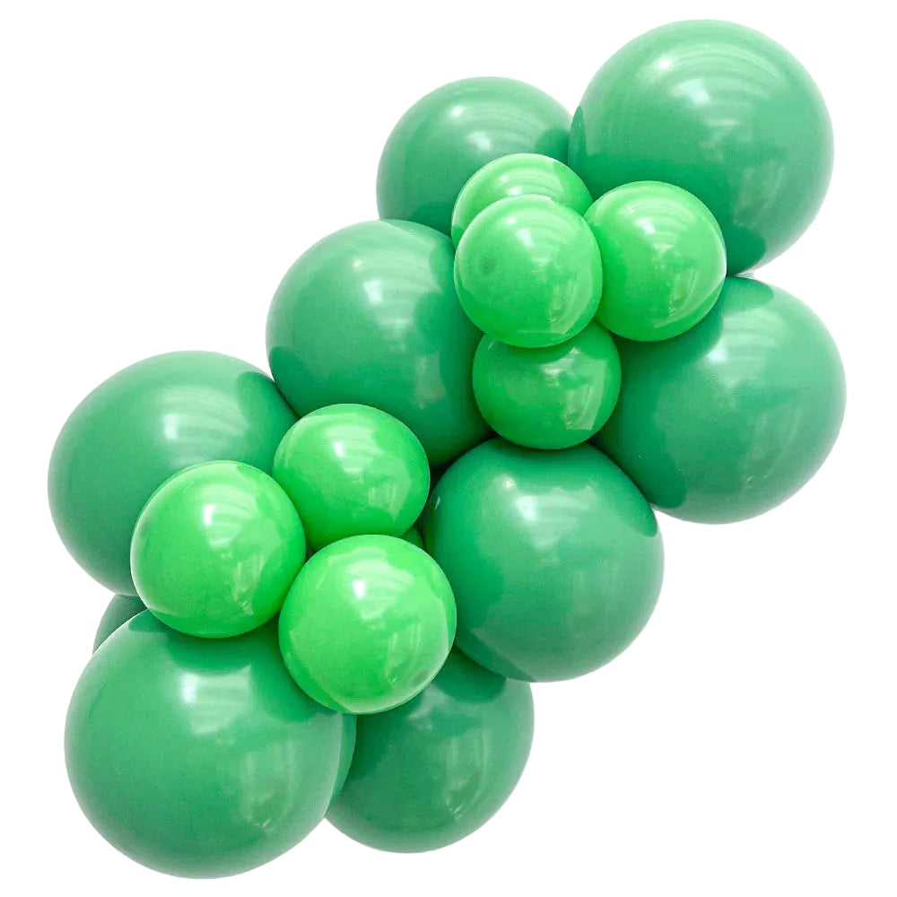 Cluster of green balloons on a white background