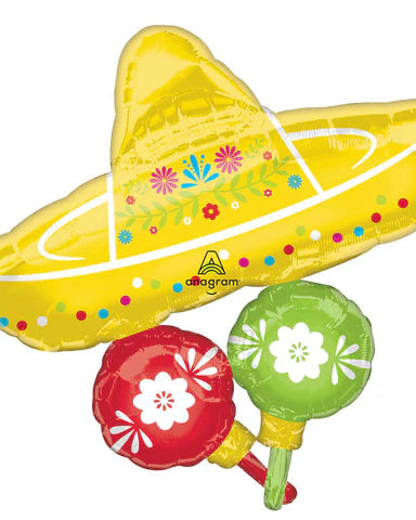 Decorative balloon shaped like a yellow boat with floral patterns, accompanied by red and green maracas on a white background.